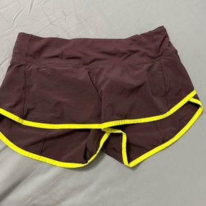 Purple and yellow speed up lululemon shorts